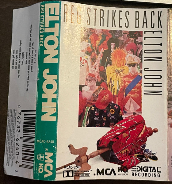 Elton John : Reg Strikes Back (Cass, Album, Dol)