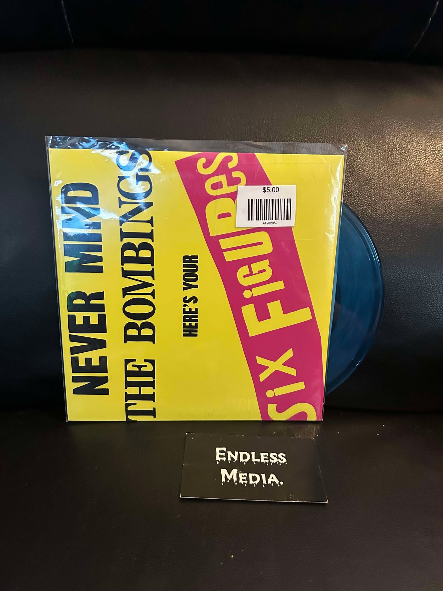 United Nations - Never Mind The Bombings, Here's Your Six Figures (7") (VG+)