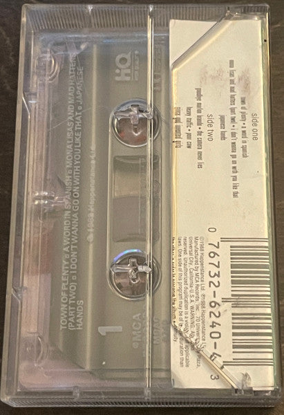 Elton John : Reg Strikes Back (Cass, Album, Dol)