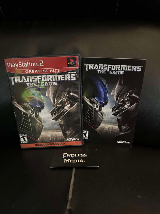 Transformers: The Game [Greatest Hits] Sony Playstation 2 Box and Manual Video Game